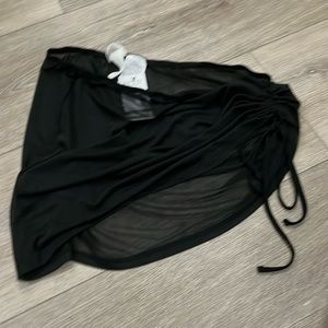 Women’s black beach, mini skirt